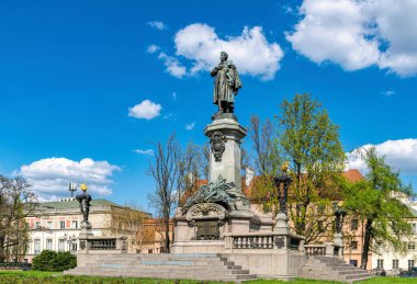 Warsaw, Poland - May 01, 2023: Monument to Adam Mickiewiczin the Krakow suburb of Warsaw, 1898. The authors are the sculptor Cyprian Godebskyi, architects Jozef Pius Dzekonskyi and Vladyslav Marconi