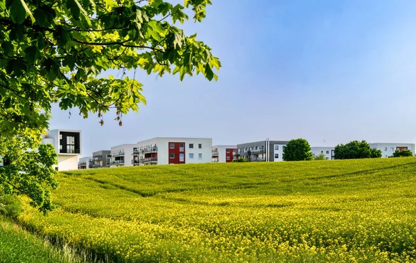 Modern new residential  buildings and agricultural fields