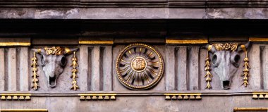 Mystical bas-reliefs of animal skulls. Decorations of facades of medieval houses in Gdansk clipart