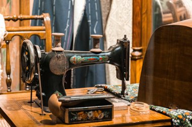 Vintage sewing machine and old sewing workshop