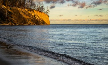 Orlowo cliff and sandy beach on the coast of the Baltic Sea in Gdynia