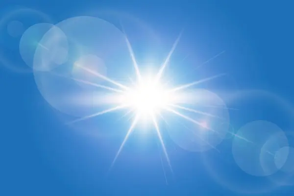 Parlak güneş ve mercek parıltısıyla güneşli mavi arkaplan