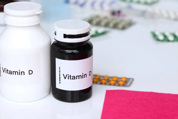 Vitamin D pills in a bottle, food supplement for health or used to treat disease