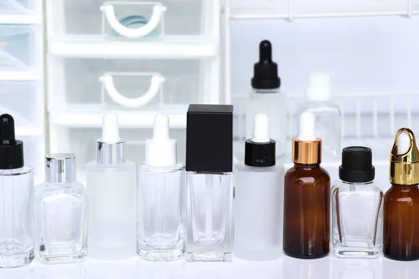 Beauty product bottle or serum bottle on white background, skin care products