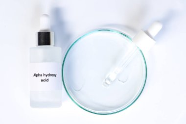 Alpha hydroxy acid in a bottle, chemical ingredient in beauty product, skin care products clipart