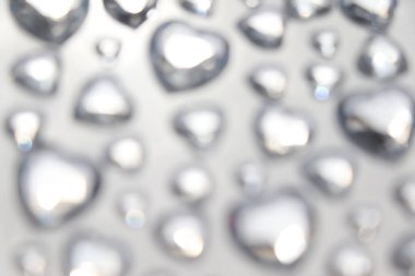 Arka planda kalp şekli bulanıklığı, kart ve bokeh, Sevgililer Günü geçmişi