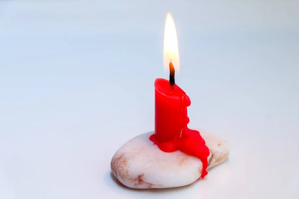 Candle light in the day, Candle light on white background and stone
