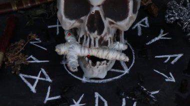 magic doll and White occult symbol on the witchcraft blackboard photo