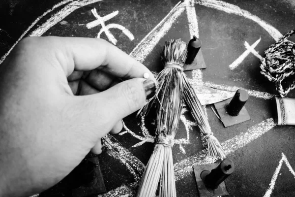 magic doll and White occult symbol on the witchcraft blackboard photo, religion and belief