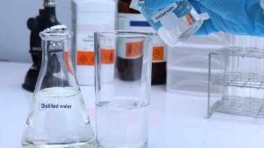 Distilled water in bottle ,sample water in the laboratory and industry