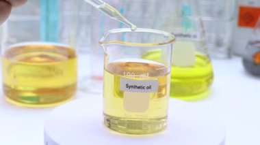 Synthetic oil in bottle ,sample oil in the laboratory and industry