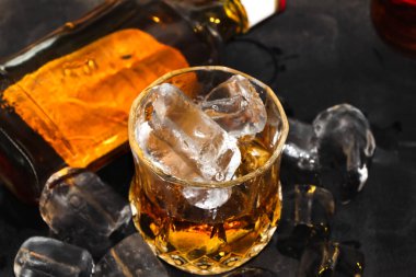 red strong alcohol drinks, hard liquors, spirits and distillates iset in glasses