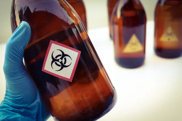 Virus symbol on bottle chemical ,warning symbol, chemical in laboratory and industry