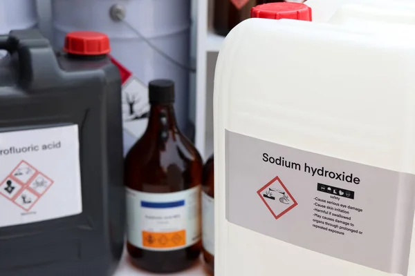 Sodium hydroxide, Hazardous chemicals and symbols on containers, chemical in industry or laboratory