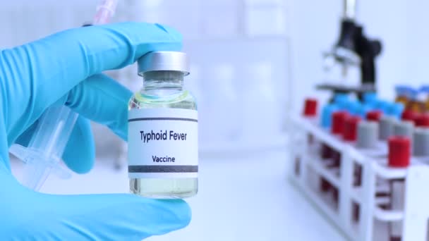 Εμβόλιο Τυφοειδούς Πυρετού Φιαλίδιο Ανοσοποίηση Και Θεραπεία Λοίμωξης Επιστημονικό Πείραμα — Αρχείο Βίντεο
