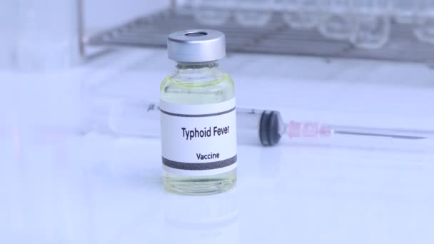 腸チフス 感染症のバイアル 免疫および治療におけるワクチン 科学実験 — ストック動画