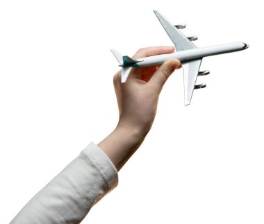 Beyaz arka planda izole edilmiş çocuk ve oyuncak uçak