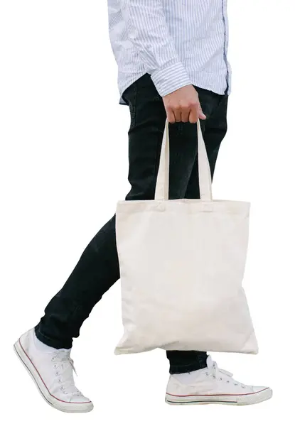 男人手里拿着白色的纺织品生态袋 白色环保袋 用于模拟白色背景 — 图库照片