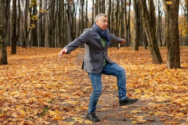 Full Length Photo Energetic Aged Man Dancing Path Golden Forest — Foto Stock