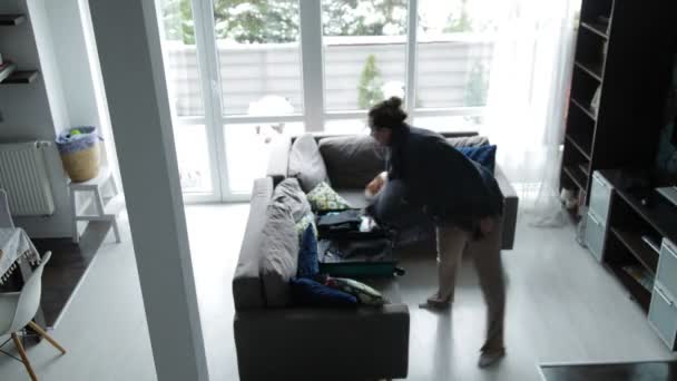 Timelapse Middle Aged Woman Spending Time Home Packing Clothes Turquoise — Stock Video