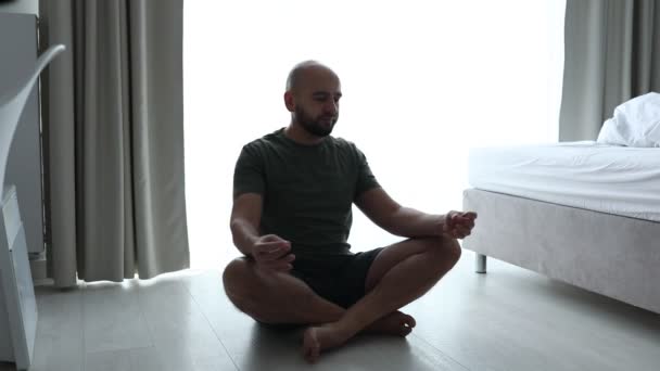 Relaxed Calm Confident Bald Unshaven Man Sitting Yoga Lotus Pose — Wideo stockowe