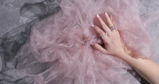 Animation Elegant Woman Hand Manicure Holding Pink Sateen Textile Presenting — стоковое видео