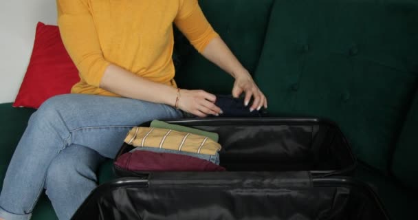 Video Cropped Unrecognizable Woman Stacking Folding Packing Compactly Clothes Travelling — Vídeo de Stock