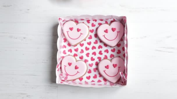 Women Bite Cookie Hands Put Box Gingerbread Shape Smiling Hearts — Vídeos de Stock