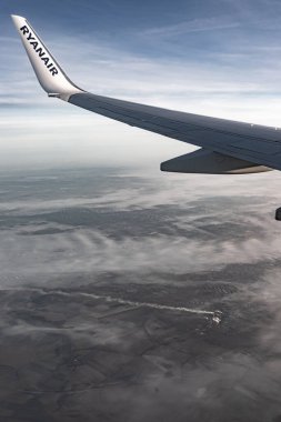 Beautiful colorful sunset sky from the height of an airplane. High quality photo
