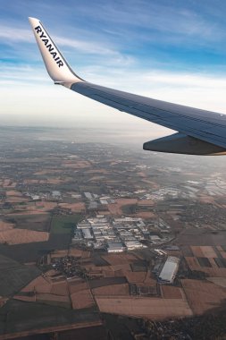 Beautiful colorful sunset sky from the height of an airplane. High quality photo