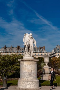 cosy Paris street with view on the famous Eiffel Tower on a cloudy summer day, Paris France, toned. High quality photo
