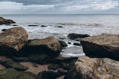 Early morning sunrise over the sea . Some clouds. High quality photo clipart