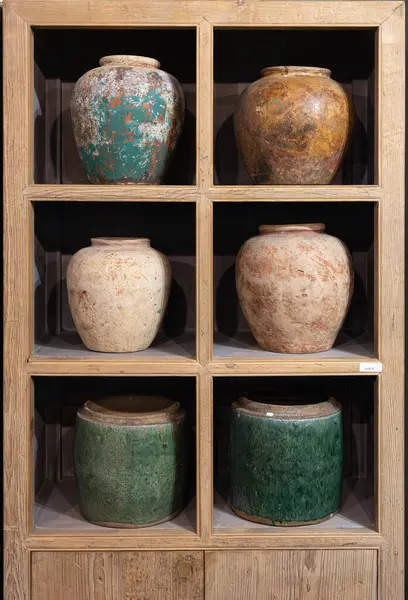 Antique Coloured Porcelain Empty Vases Displayed on a Shelf.