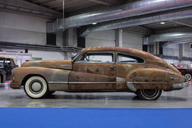 Rusty Buick Fastback Coupe Roadmaster Sedanette Produced in 1946. clipart