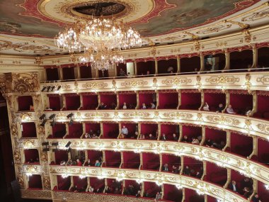 The Grand Interior in Gold and Red of the Parma's Opera House, Italy. clipart