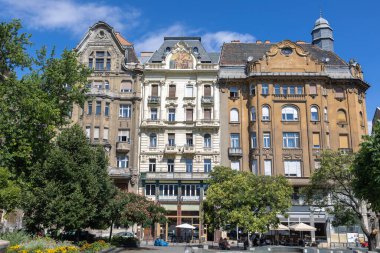 Fovam Square and its Art Nouveau Facades, Old Buildings in Budapest, Hungary. clipart