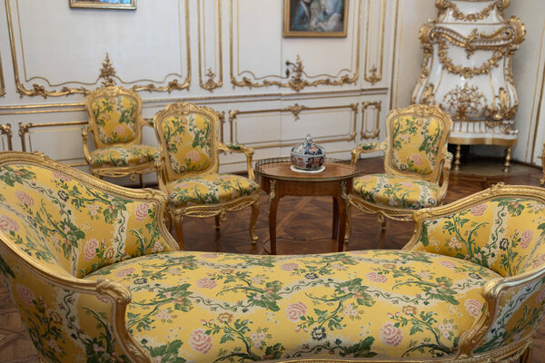 Luxurious Sitting Room in Schnbrunn Palace in Vienna with Gilded Accents and Floral Pattern, Austria