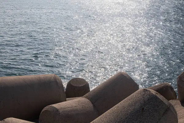 stock image A sea of surf and breakwater, tetrapod.