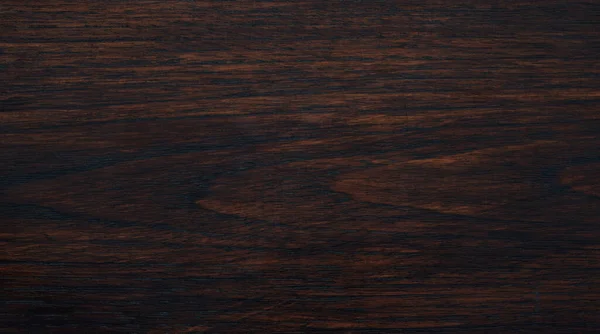 Arka plan için kahverengi bir odunu kapat.