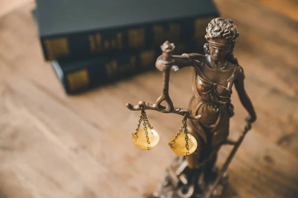 Lady justice,lady justice statue on table,Law theme, mallet of the judge, law enforcement officers, evidence-based cases and documents taken into account.