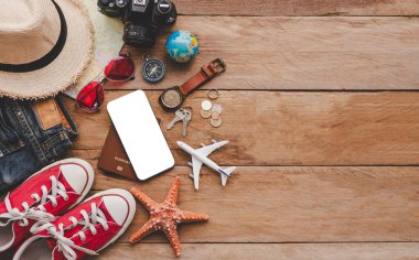 Travel accessories costumes. The cost of travel maps prepared for the trip.travel planning concept