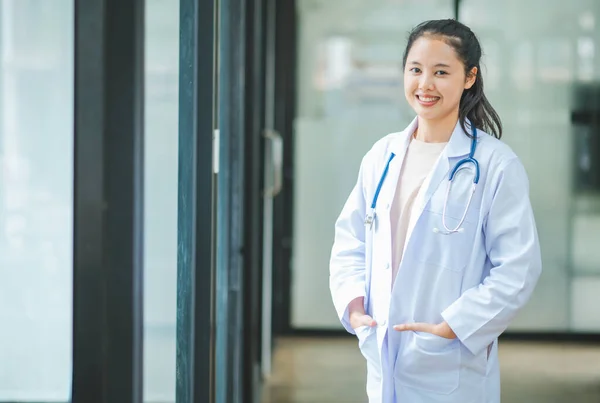 Stock image Portrait doctor with a stethoscope stands confidently ready to provide health care to patients in hospitals or clinics.