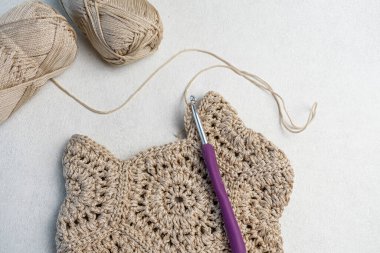 knitting, crochet, knitted, yarn on a white background. needlework concept
