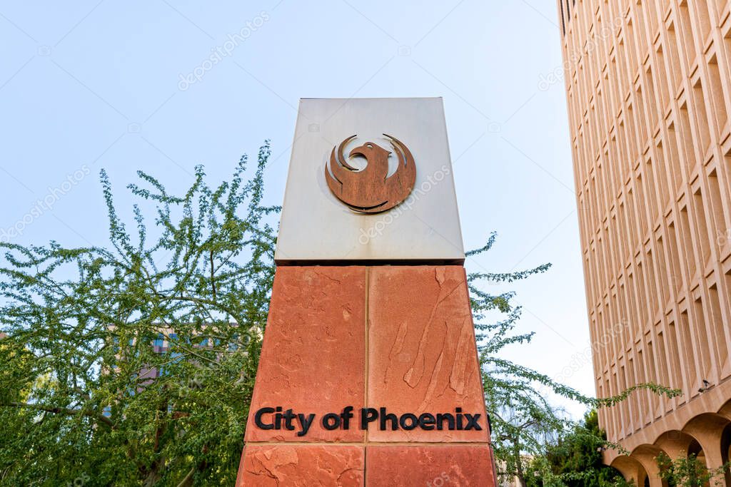 Phoenix, AZ - Nov. 10, 2022: City of Phoenix on a pillar downtown includes the official bird logo for the city.
