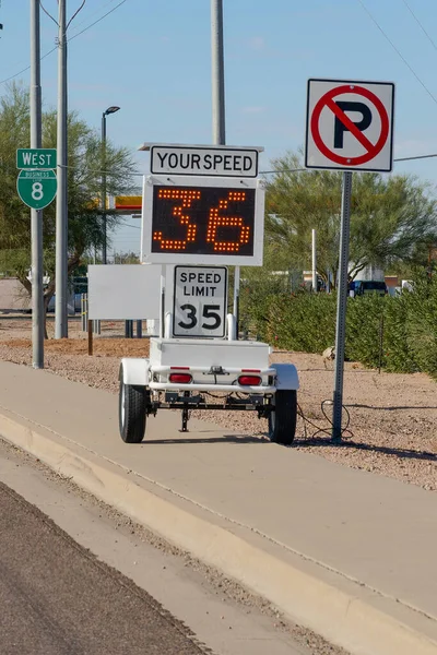 mobile speed limit sign on a trailer with speed detector and your speed electronic readout on the side of the road to alert drivers to possible speeding and slow them down