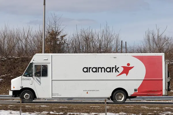 맨체스터 2022년 Aramark는 15개국의 회사에 유니폼 서비스를 제공하는 회사입니다 스톡 사진