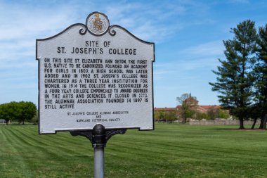 Emmitsburg, Maryland - April 23, 2024: Historical marker for the site of St Joseph's College, an academy for girls, founded in 1809 by Saint Elizabeth Ann Seton. clipart