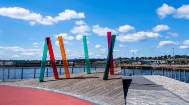 Saint John, NB, Canada - Sept. 11, 2024: Public art at the waterfront near Market Square. clipart