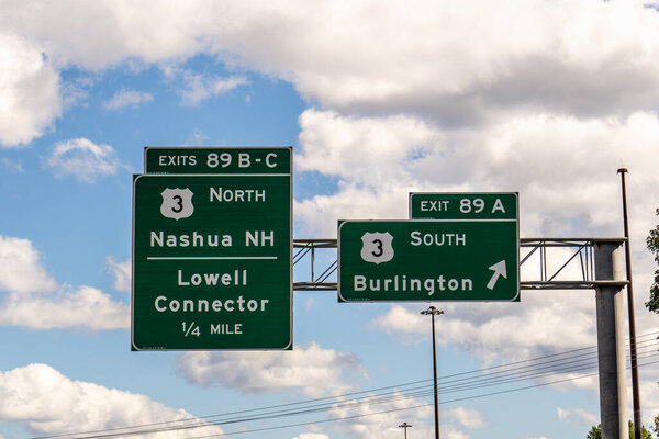 exit signs on I-495 for 89 B-C US-3 North toward Nashua, NH and Lowell Connector, and 89 A US-3 South toward Burlington, MA