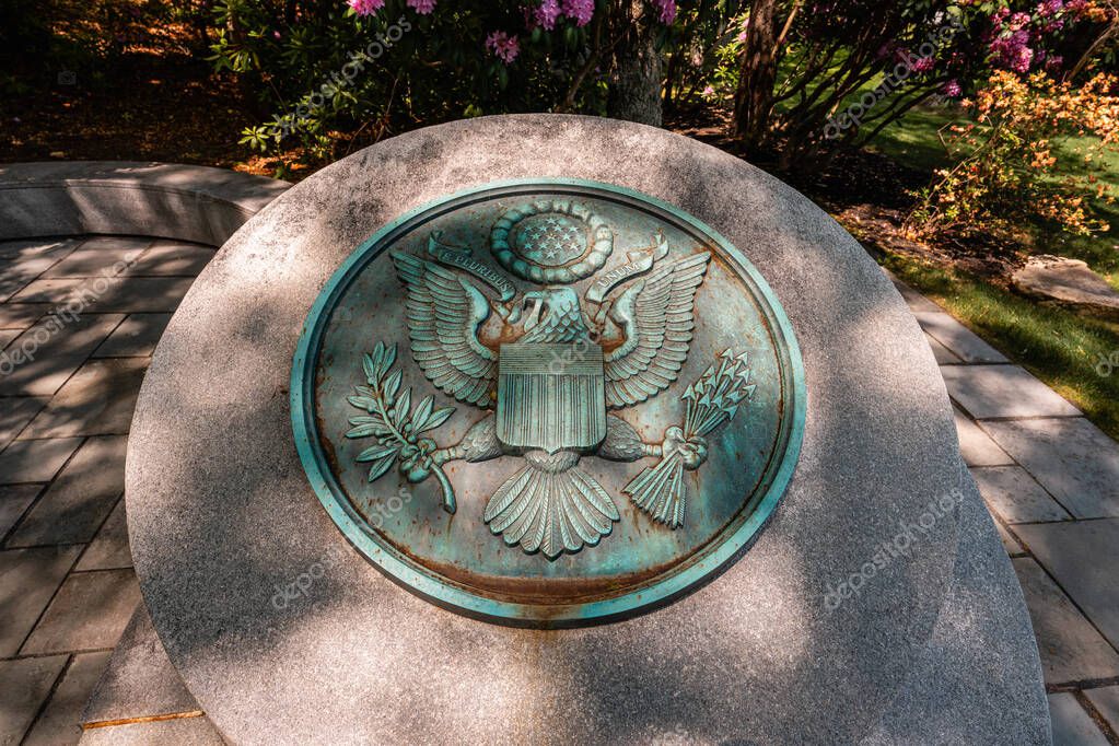 Bourne, Massachusetts - June 3, 2025: National Seal Marker at the Massachusetts National Cemetery.